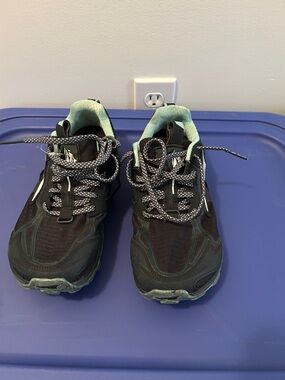 Altra women’s navy blue Sneakers with Mint Green lone peak with stone guard